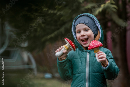 Obraz na plátně A child and a fly agaric