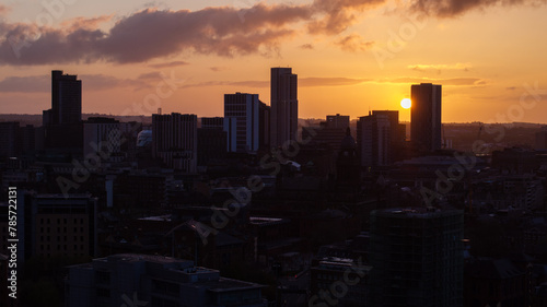 The cityscape of Leeds during the golden hour, showcasing the Building silhouettes against a vibrant sky and the Sunrise, depicting the beauty of this West Yorkshire city © jmh-photography