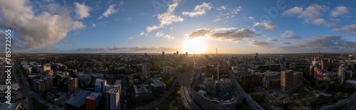 This stunning panoramic shot of Leeds captures the sunrise peering over the city centre, with construction sites and buildings bathed in morning light