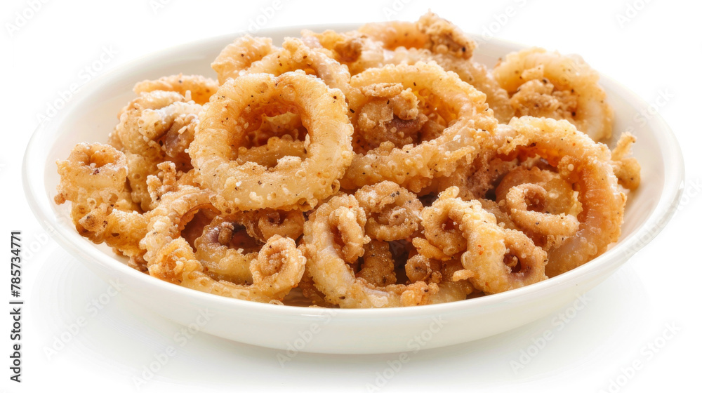 Delectable dish of golden-brown fried calamari served on a white plate Delectable dish of golden-brown fried calamari served on a white plate
