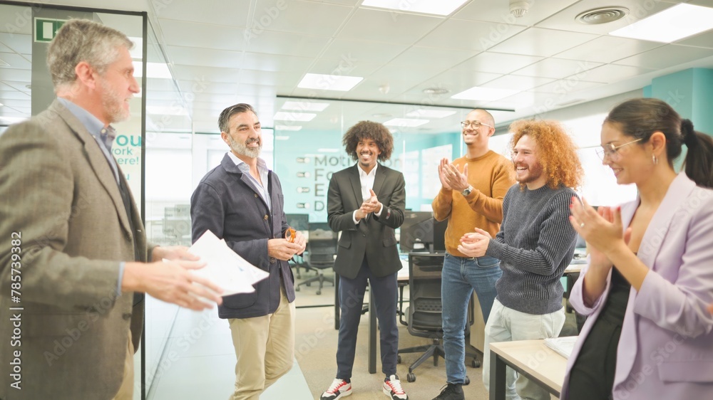 Team clapping for a successful presentation in a contemporary office. Team clapping for a successful presentation in a contemporary office.