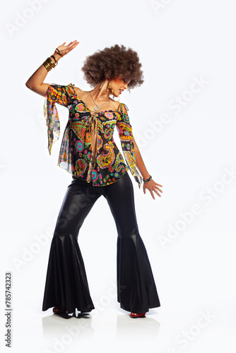 White background studio photo of an ethnic girl disco dancing. 