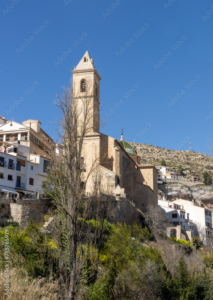 Alcalá del Júcar, is located on a rock formed by the gorge of the Júcar River, cave houses roman bridge, castle, Church of San Andrés Apóstol (Albacete, Spain).