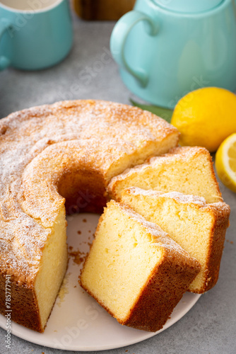 Lemon pound cake baked in a bundt pan topped with powdered sugar © fahrwasser