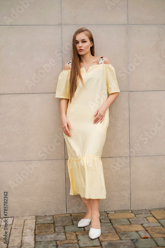 lady in yellow summer outfit outdoors