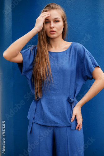 lady in blue summer outfit outdoors