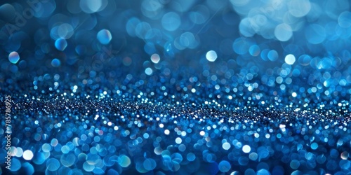 Blue backdrop adorned with myriad small blue dots, creating a subtle and intricate pattern photo