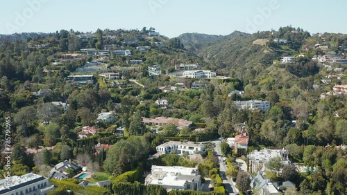 Aerial shots of exclusive luxury Beverly Hills residence, mansions, palm trees