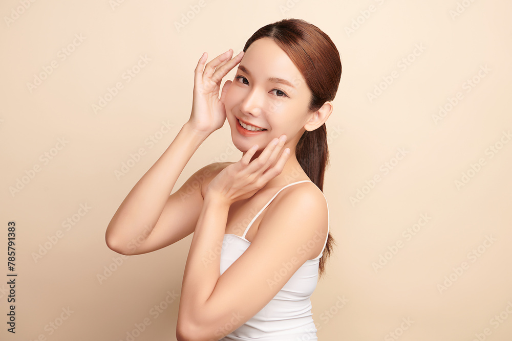 Beautiful young asian woman with clean fresh skin on beige background, Face care, Facial treatment, Cosmetology, beauty and spa, Asian women portrait. Beautiful young asian woman with clean fresh skin on beige background, Face care, Facial treatment, Cosmetology, beauty and spa, Asian women portrait.