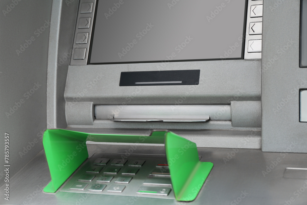 Modern automated cash machine with screen and keypad Modern automated cash machine with screen and keypad