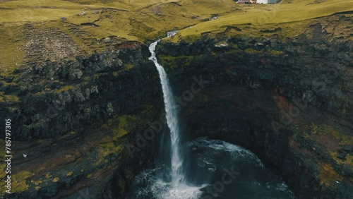 Mulafossur waterfall, Faroe Islands: fantastic aerial view over the famous waterfall in a spectacular setting. photo