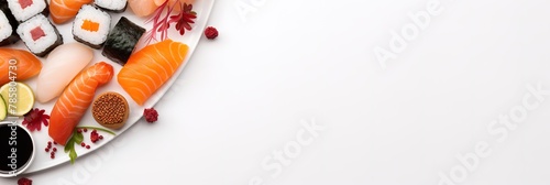 Assorted sushi plate on white background, wide banner for culinary articles and restaurant menu design, copyspase for text. photo