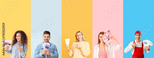 Group of designers with color samples on color background photo