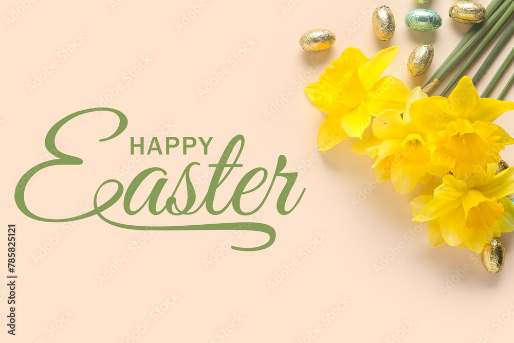 Yellow flowers and chocolate Easter eggs on beige background
