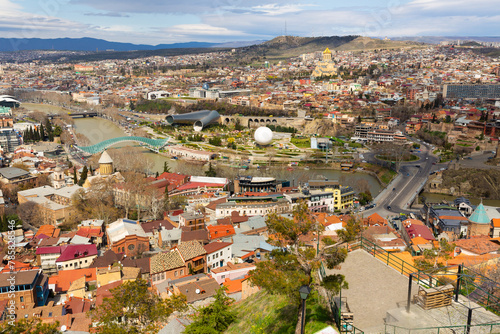 Beautiful view of Kura river and Bridge of Peace in Tbilisi, Georgia