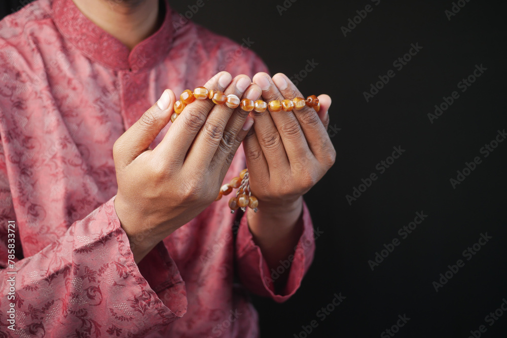 muslim man praying during ramadan, Close up 
