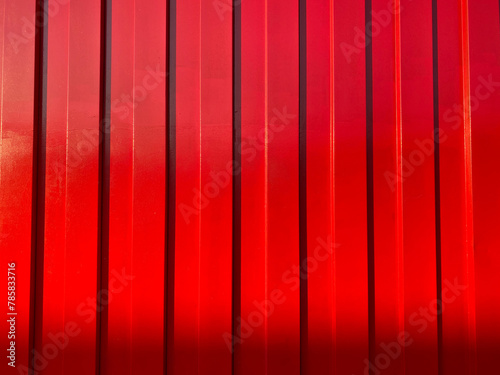 red painted wall with striped texture