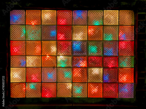 Christmas lights behind glass block window