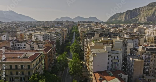 Palermo Italy Aerial v11 drone flyover along city main thoroughfare Via della Libertà capturing street lined with historic buildings and mountain landscape views - Shot with Mavic 3 Cine - May 2023 photo