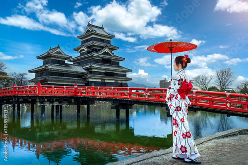 Asian woman wearing japanese traditional kimono at Matsumoto Castle, Nagano in Japan. © tawatchai1990