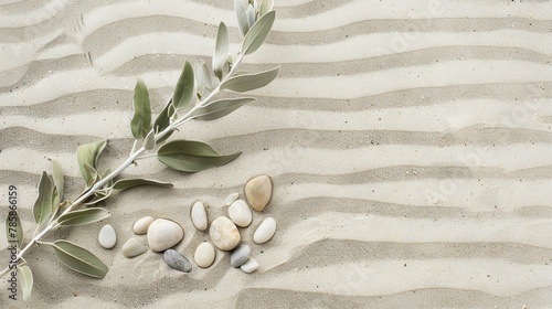 Olive branch and zen stones on sandy background. A serene and peaceful image capturing an olive branch beside smooth stones on a textured sandy surface, symbolizing tranquility and nature simplicity photo