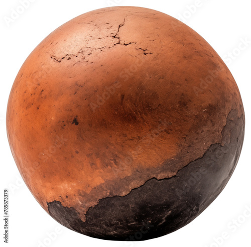 An earthen ball of harden clay, cracked yet round, isolated