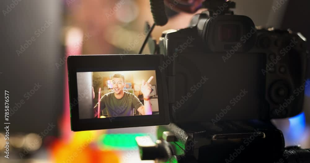 Video camera, screen and man gamer in a house for content creation, feedback or network communication. Social media, blog or male influencer with gaming, advice or filming esports review for podcast Video camera, screen and man gamer in a house for content creation, feedback or network communication. Social media, blog or male influencer with gaming, advice or filming esports review for podcast