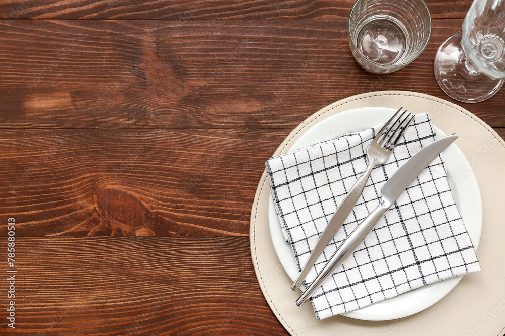 Beautiful table setting on wooden background Beautiful table setting on wooden background