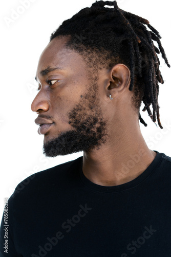 A profile portrait of an African American man with dreadlocks