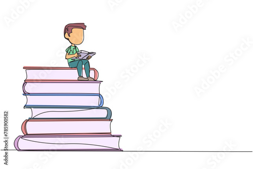Single continuous line drawing happy boy sitting on a pile of books reading a book. High interest in reading. Opening horizons of thinking. Book festival concept. One line design vector illustration