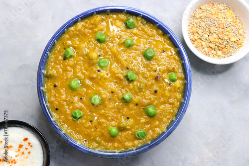 Healthy Quinoa dal khichdi. Made with quinoa, lentils, veggies, and spices, this quinoa dal khichdi is a one pot nutritious weight loss meal. Served with yougurt or curd. Copy Space