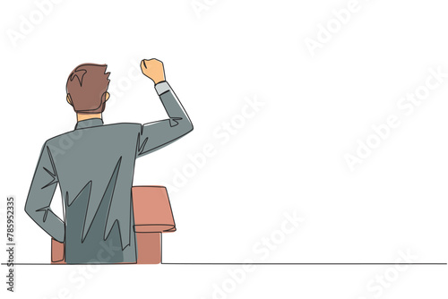 Continuous one line drawing rear view of a businessman speaking at the podium. Raising and clenching hands, he enthusiastically gave financial gain oration. Single line draw design vector illustration