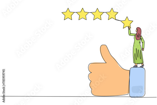 Single one line drawing young happy Arabian woman standing on thumbs up wants to attach the stars to form 5 stars in a row. Give review or good feedback. Continuous line design graphic illustration