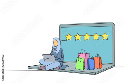 Continuous one line drawing happy Arabian woman sitting on big laptop typing on laptop. Bought a lot from online shop. Give a review of 5 stars. Ecommerce. Single line draw design vector illustration