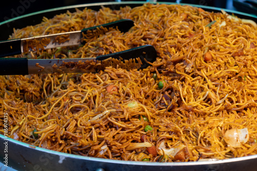 Photography Local asian food, singapore noodle and rice dish with vegetables, fried shrimps