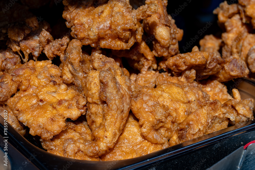 Korean food, asian fast food, fermented chicken pieces deep fried in oil Korean food, asian fast food, fermented chicken pieces deep fried in oil