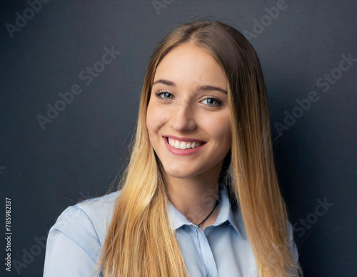 Portrait of blond beautiful young woman with long hair blonde on a dark background