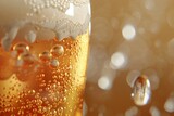 Closeup of beer with bubbles on bokeh light background