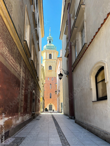 a narrow street in the old town of Warsaw