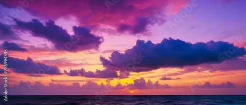 Panorama of Beautiful view sunset sky over sea  Colorful dramatic majestic scenery sunset Sky with Amazing clouds and waves in sunset sky purple light cloud background