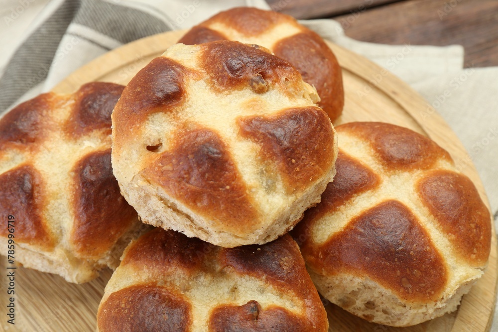 Tasty hot cross buns on table, closeup Tasty hot cross buns on table, closeup
