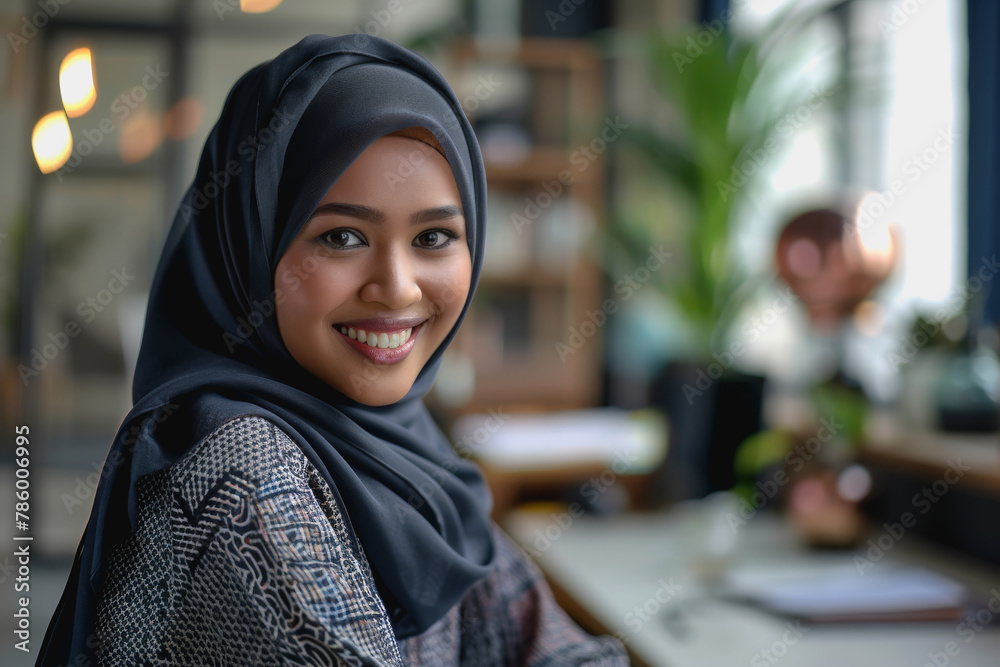 Islamic business professional working in an office expertise in business efficiency and marketing planning Islamic business professional working in an office expertise in business efficiency and marketing planning