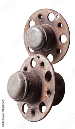 Wheel hub with bearing from old metal close-up on white isolated background in a photo studio. Seasonal repair of the suspension and braking system in the workshop or spare parts for sale.
