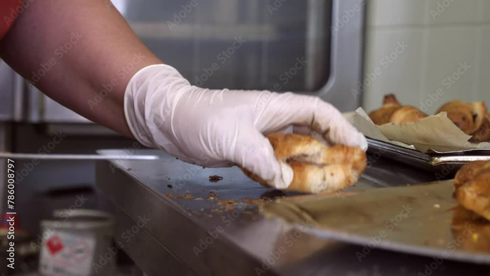 Culinary Artistry: Precision Opening of Savory Croissants Culinary Artistry: Precision Opening of Savory Croissants
