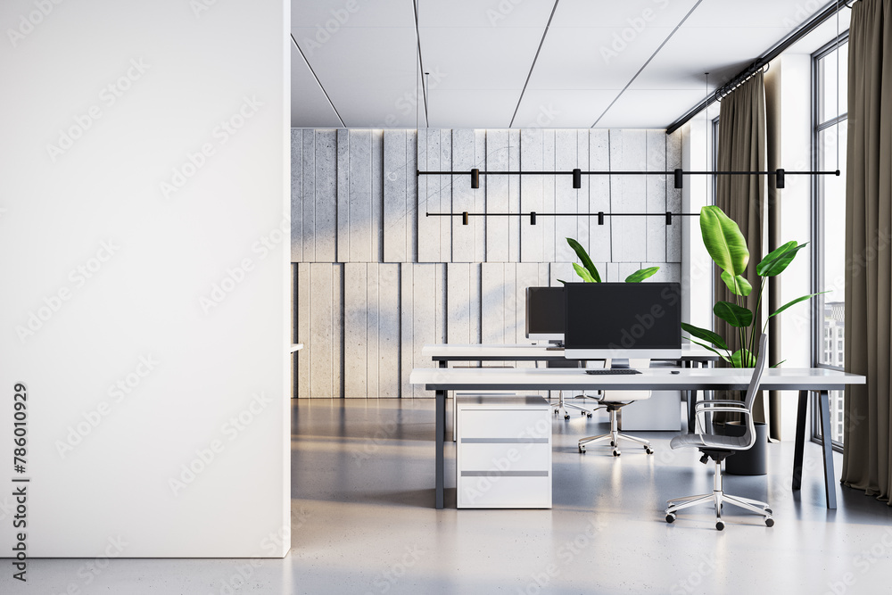 Obraz premium Modern minimalist office interior with open space, sleek furniture, and natural light. 3D Rendering