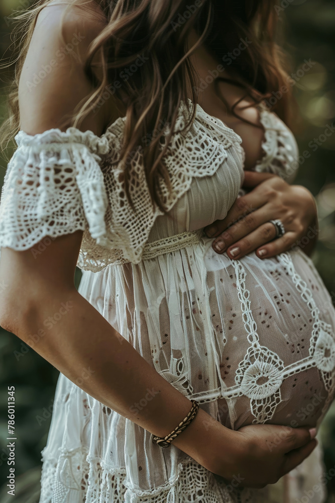 pregnant woman on the background of nature close-up
