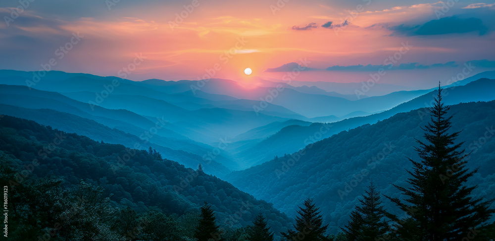 A beautiful mountain range with a blue sky and a sun setting in the background
