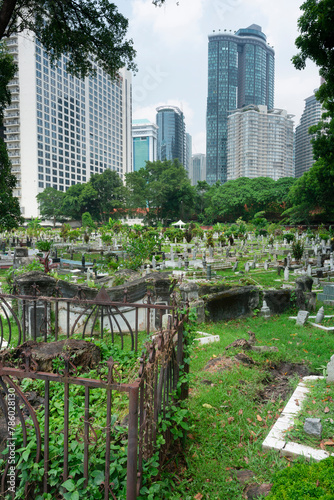 Canvas Print Jalan Ampang Muslim Cemetery,in the heart of KL City,overlooked by tall modern buildings,Kuala Lumpur,Malaysia
