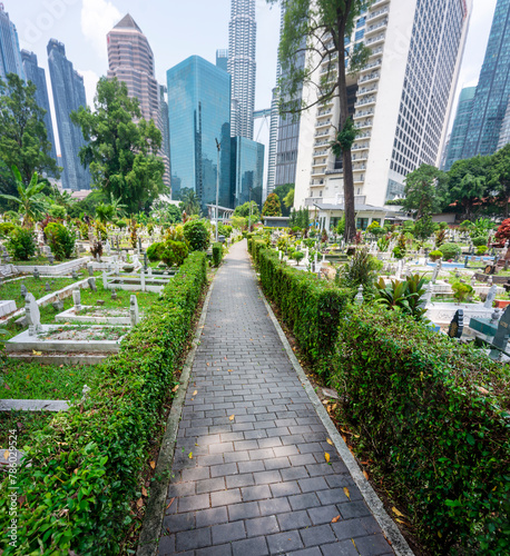 Jalan Ampang Muslim Cemetery,in the heart of KL City,overlooked by tall modern buildings,Kuala Lumpur,Malaysia.