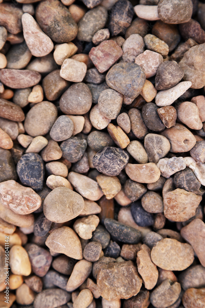 Smooth round pebbles texture background. Pebble sea beach close-up, dark wet pebble and gray dry pebble. High quality photo Smooth round pebbles texture background. Pebble sea beach close-up, dark wet pebble and gray dry pebble. High quality photo